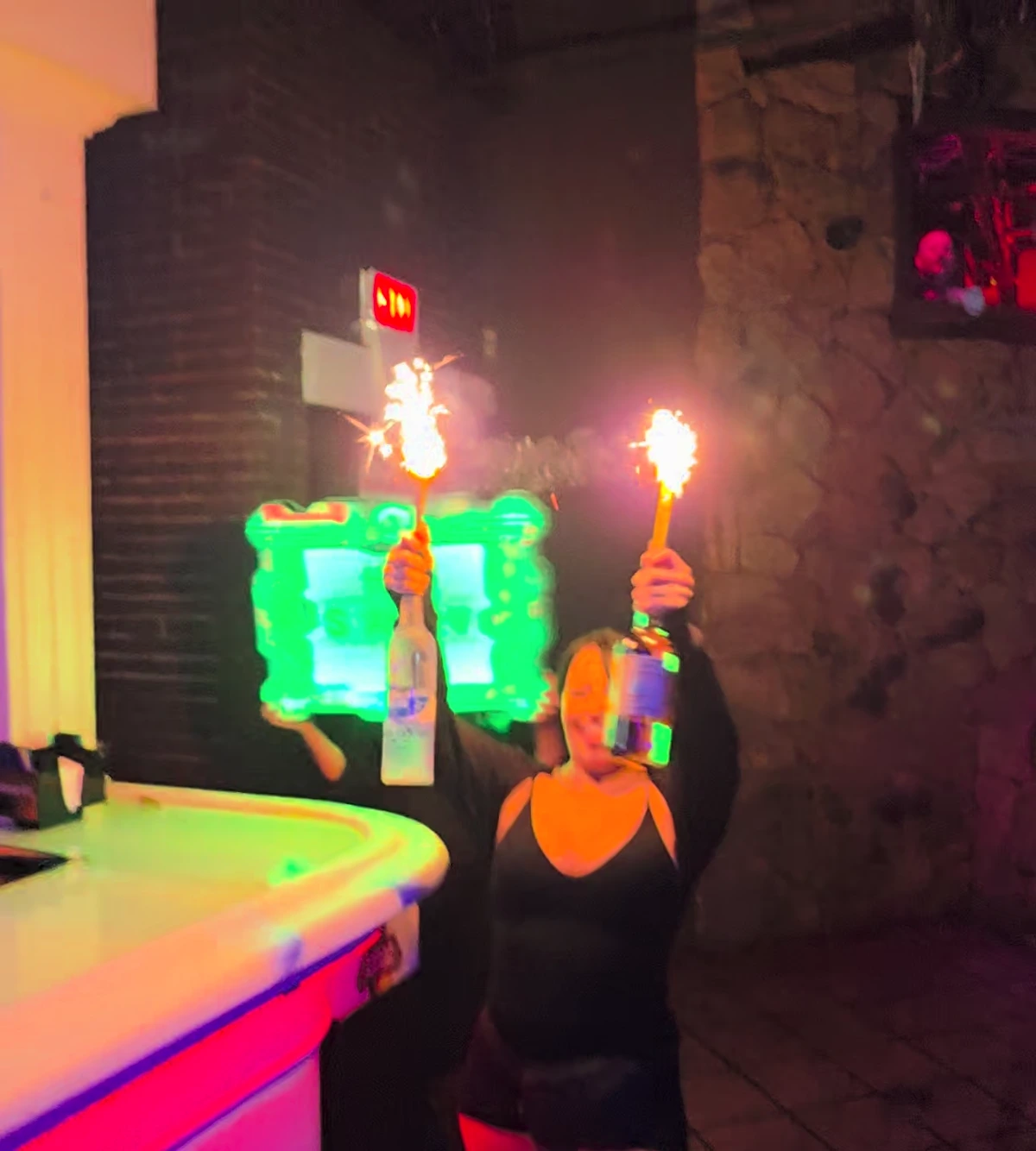 Two bottles and sparklers at the Whiskey bar