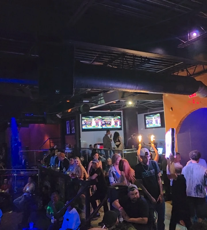 A bottle-service procession makes its way across Whiskey A Go-Go