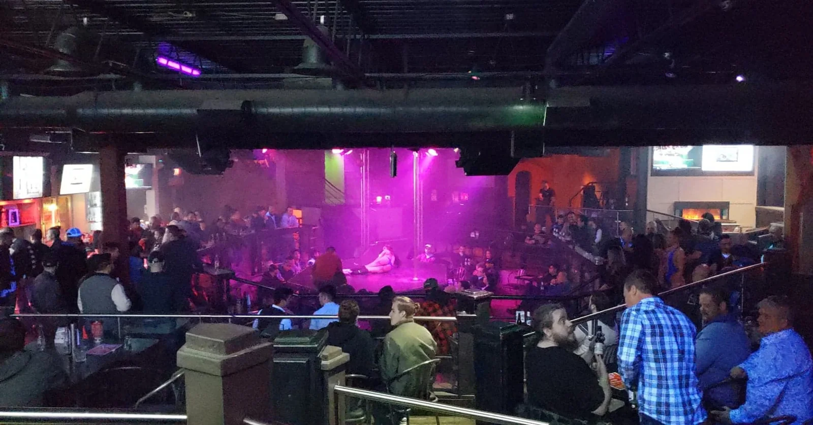 Guests and stage lighting inside Whiskey A Go-Go.
