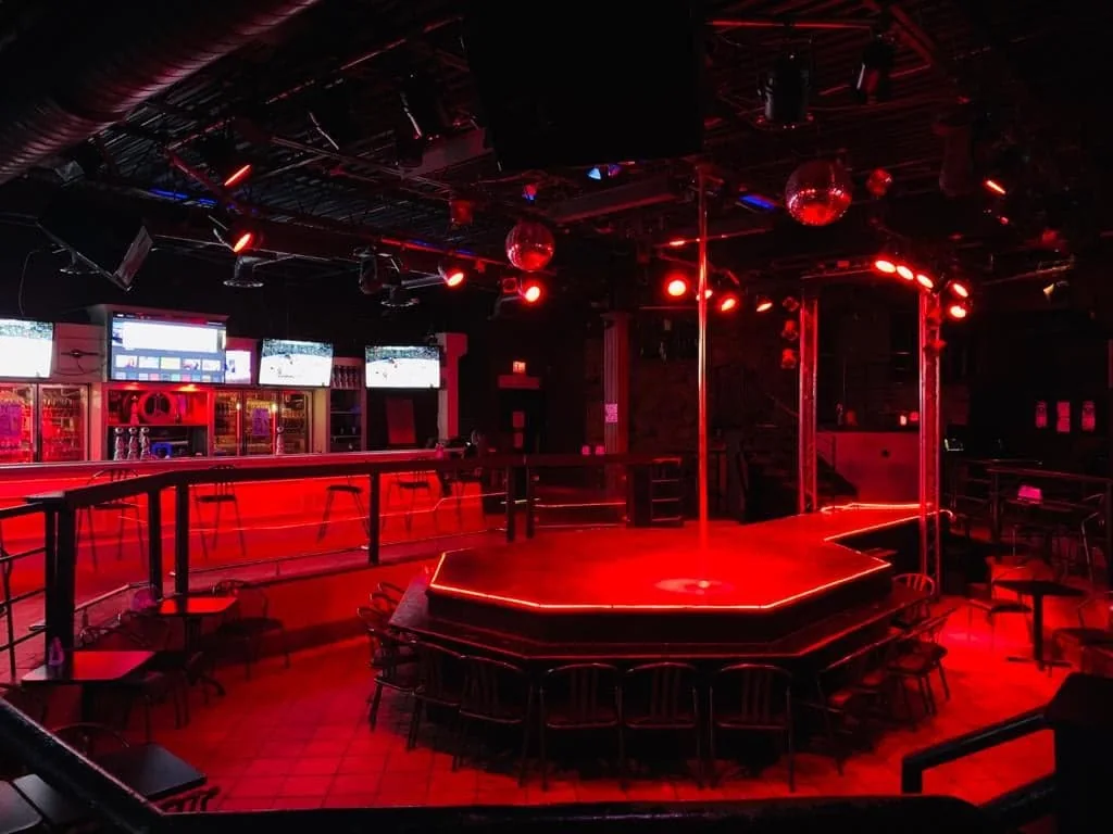 The red-lit main stage and bar at Whiskey A Go-Go.